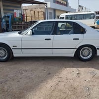 ٥٢٥ i • مكينه وكير حاويه • جلد أسود