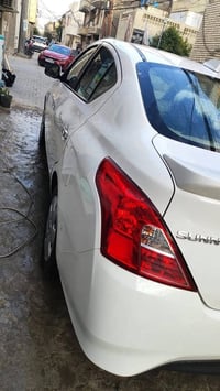 نيسان سني موديل ٢٠٢٤ هندي بليتة زرقاء ضمان شركة السور رقم بغداد انكليز...