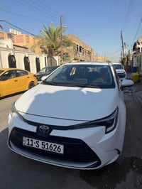 بيع كورلا هايبرد موديل 2024 الشكل الامريكي  ماشيه 47 الف  سيارة جديده ...
