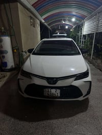 تيوتا كورلا هايبرد صيني شكل خليجي محرك 1.8 هايبرد رقم بغداد ماشية: 21 ...
