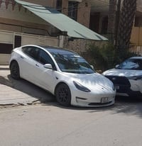 تسلا مودل 3    موديل 2023   ماشية 71 الف  تك ماطور  اون لاين اخر تحديث...