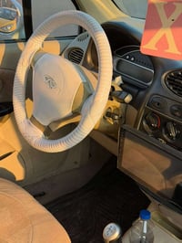 شيري كيوكيو • مدينة الصدر • شارع الفلاح