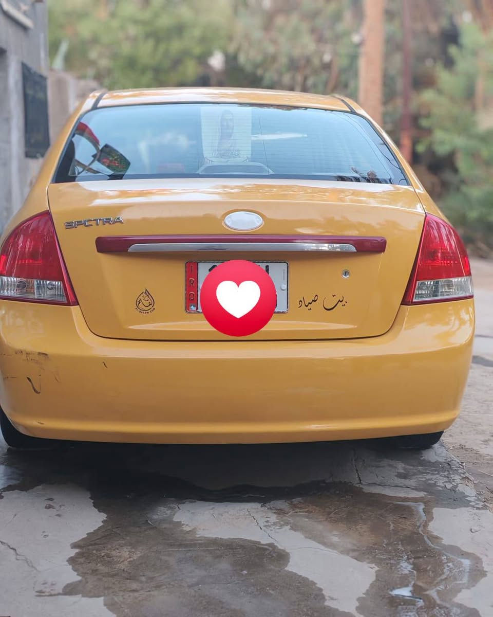 ***********سبكترا موديل 2007  أمريكي حادثها جاملغ خلفي ب أمريكا فقط وهنا ب العراق شويه ب الباب الخلفي وسيارة معمرة جديدة ومصبوغة صبغ عام ماناقصها بس التبريد مكينة وكير خير من الله
