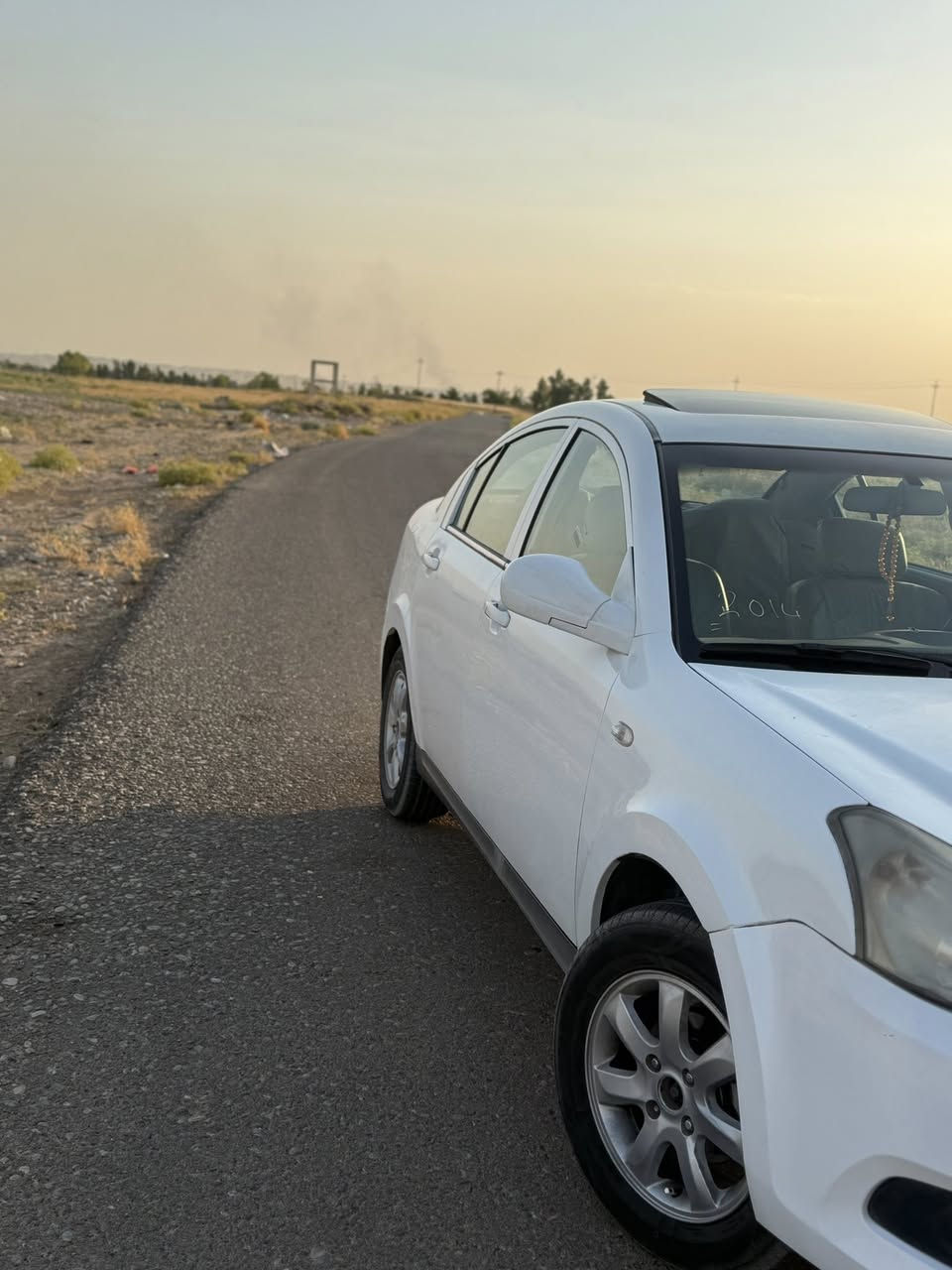 سەیارەی E5 مۆدیل ٢٠١٤  گێر و مەکینە بە شەرت چوار تایەی تازەی لەسەرە  سەنەوی تازەیە تا ٢٠٣٠ هەزەشی تەواو نەبووە کۆبۆنی بەنزینشی هەیە یەک دەرگا و جاملغێکی هەیە بۆ نرخ پەیوەندی بکەن 
***********
