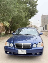 اوبتيما ٢٠٠٤ • مكينه وكير شرط • رقم بابل