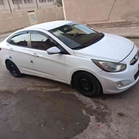 اكسنت • ٢٠١٤ • رقم بغداد