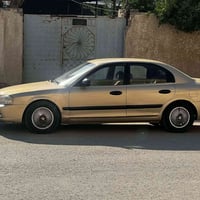 اوبتيما • ٢٠٠٢ • رقم بابل