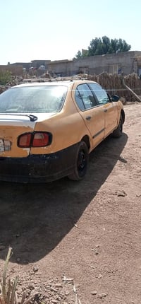 نيسان سنترا • ٢٠٠١ • رقم بغداد