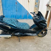 دراجة نارية • موديل 09 • قلعة سكر