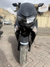 دراجهNMAX مكينه مكفوله حديثه ماشيه 26 ستاند حساس يدات تدفئه المكان بغد...