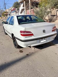 للبيع بيجو ٤٠٦ رقم هزة جديده بيها صبغ الباب أثر شخط والداير ومكان السد...