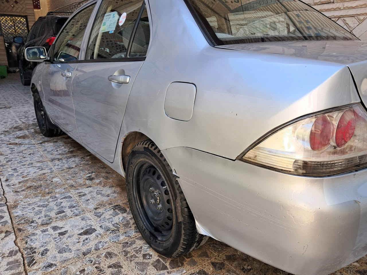 لانسر ٢٠١٠ رقم جديد سنويه جديد سياره نضيفه تبريد شغال سعر٧٥ وبي مجال هاتف *********** بي واتساب مكان السياره بعقوبه
