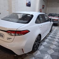 للبيع كورلا هايبرد شكل الامريكي 2024 علامه سوده فول مواصفات داخل اسود ...