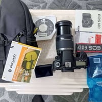 كانون D60 • عدسة 18-200 • ملحقات كاملة