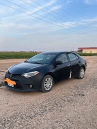 كورلا 2016 ماشيه 330 آلاف ميل سنويه ساقطه رقم سليمانية محرك مبدل كازكي...