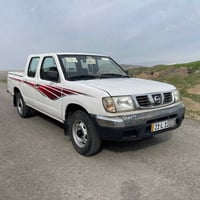 نيسان بيكاب • ٢٠٠٢ • تايرات جديدة