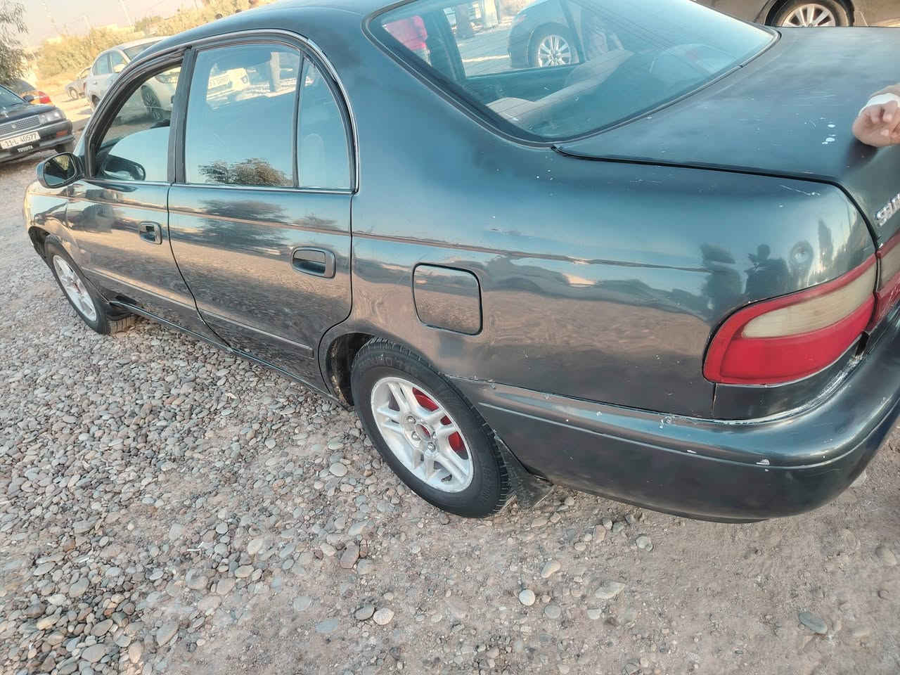 كرونة موديل ٩٣ سيارة نضيفة رقم بغداد بسمي مكانه ديالى رايدهة ٤٥ وبيهة مجال ***********
