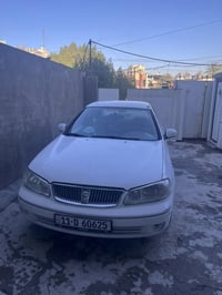 نيسان صني 2009 للبيع السعر 100 $  رقم بغداد جديد  سنوية جديدة  مكينة و...