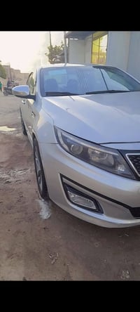 سياره اوبتيما موديل 2014 وارد امريكي  رقم بغداد مشروع وطني باسمي تحويل...