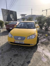 الانترا مقدس موديل 2009 سنويه ورقم بغداد انكليزي مصفره خط وبحث وغرامات...