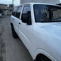 نيسان باترول موديل2002 السياره مكينه وكير شرط خير من الله تدفئه وتبريد...