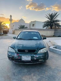 سيارة اوبل استرا حديث 2002 🔹محرك شرط لا بخار ولا صرف  🔹گير شرط 🔹جام كه...