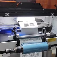 طابعة اودلي UV Dtf 30cm للبيع طابعة جديدة استخدام جدآ قليل عدة امتار ف...