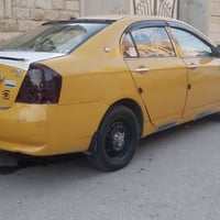 ليفان تكسي • كورلا توماتيك • ضربة جهة السائق