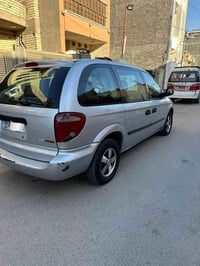 دودج كرفان 2007  محرك 4سلندر 2400، گير مكينه كفاله تبريد ثلج قطعه وحده...