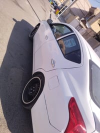 نيسان سني 21 بيها جاملق وباب مبدل سعر 95 وتجي شوف سياره وتدلل رقم الها...