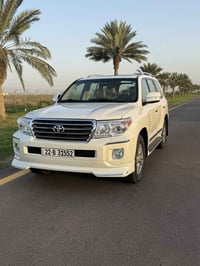 لاندكروز للبيع موديل 2013 GXR  سونار موجود مع الصور فتحة سقف كشنات جلد...