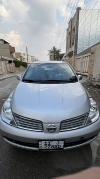 نيسان فيرسا موديل 2009 السيارة جاهزة كلش بأسمي شخصياً رقم بغداد الجديد...