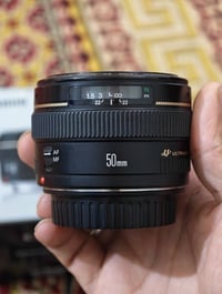 عدسة كانون 50mm f 1.4 بحالة جيدة جدا استعمال قليل (جانت مضمومة) السعر ...