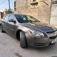 ماليبو (12) محرك (2400)  لاصرف ولاتبخير داخل جلد اسود تحكم استيرن حاكي...