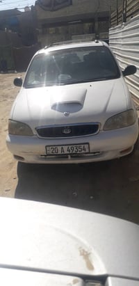 كيا كارنفال • ٢٠٠٠ • كاز