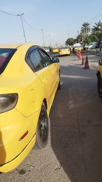 مازدا زوم 3 موديل 2006 رقم بغداد السياره جاهزة محرك وعل  وكير اوتماتيك...