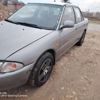 بروتون موديل 2001 سيارة نظيفة وانظف من الصور رقم جديد صاحبها الشرعي مو...