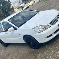 سلاموعليكوم. لانسر موديل2011كئرومه كينه به شه رت ته بريد مه زبوته دووپ...