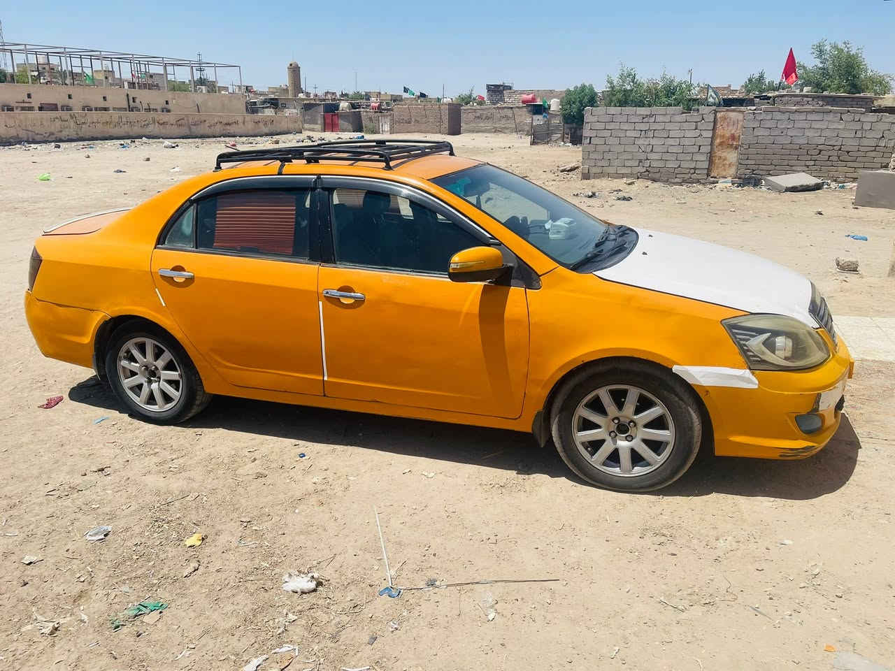 جيلي موبل ٢٠١٢ مكينة كورلة ١٨٠٠ كير عادي توني شادة مال حاوية تبريد ثلج  شاشة كامرة  (اي ضربة مابيهة بيهة خياسات بالتكم ولغود والهلالات معمرات) سيارة بسمي سنوية نتهت صار شهرين مصفرة هئة وغرامات مكاني ناصرية شهداء خلف المركز الصحي ***********.  السعر ٣٣ بيهة شوية مجال
