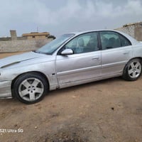 اوميغا ٢٠٠٢ • مكينة ياباني ٣٠٠٠ • رقم بصره