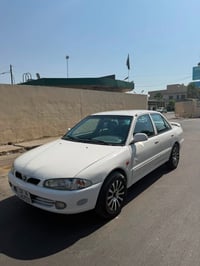 بروتون • ٢٠٠٢ • كير عادي