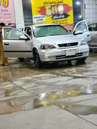 استرا 2003 • صبغ عام • جير عادي