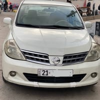 نیسان تیدا • تیدا 2009 • نیسان 2009 • تیدا اوتوماتیک • سپی صدف • سيارة...