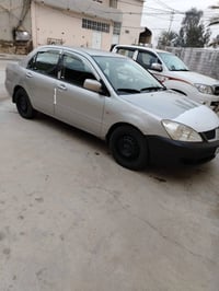 لانسر • ٢٠١٠ • مجال بسيط