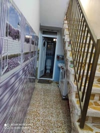 حي صدام • ١٠٠م • طابق ونص