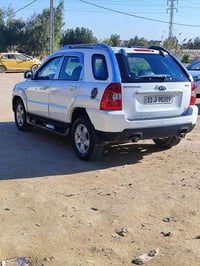 كيا سبورتج 2009 فول مواصفات رقم بغداد دولي باأسمي جاملغ امامي فقط فتحه...