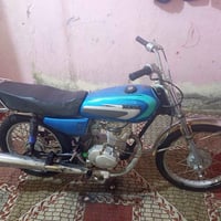 دراجة نارية • أدوات مكفولة • شغالة