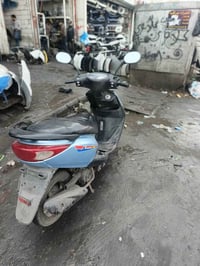 دراجه بريز خير من الله نقصها باتري وقمجي بانزين 450 بغداد طالبيه 07708...