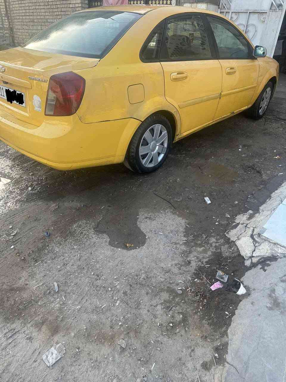 للبيع وبترا موديل ٢٠١٢ شركه عامه بدون صبغ بلاديه مكينه وكير مكفولات تبديل باب السائق فقط رقم انكليزي بغداد  الاتصال *********** مكان السياره بغداد
