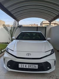 كامري 25  رقم بغداد مقترض وكفيل بيت واحد  السعر  اتصال ٠٧٧٠٩٢١٧٥١١